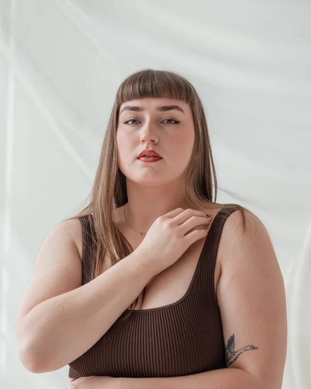 Original stock portrait with brown hair before editing